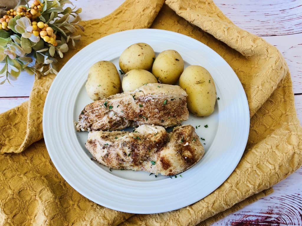You'll love this recipe for paprika chicken with garlic and golden potatoes! This dish is gluten and dairy-free and is sure to be a hit!