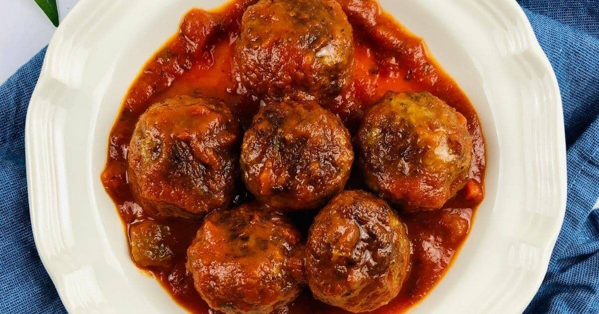 gluten free slow cooker meatballs on a white plate.