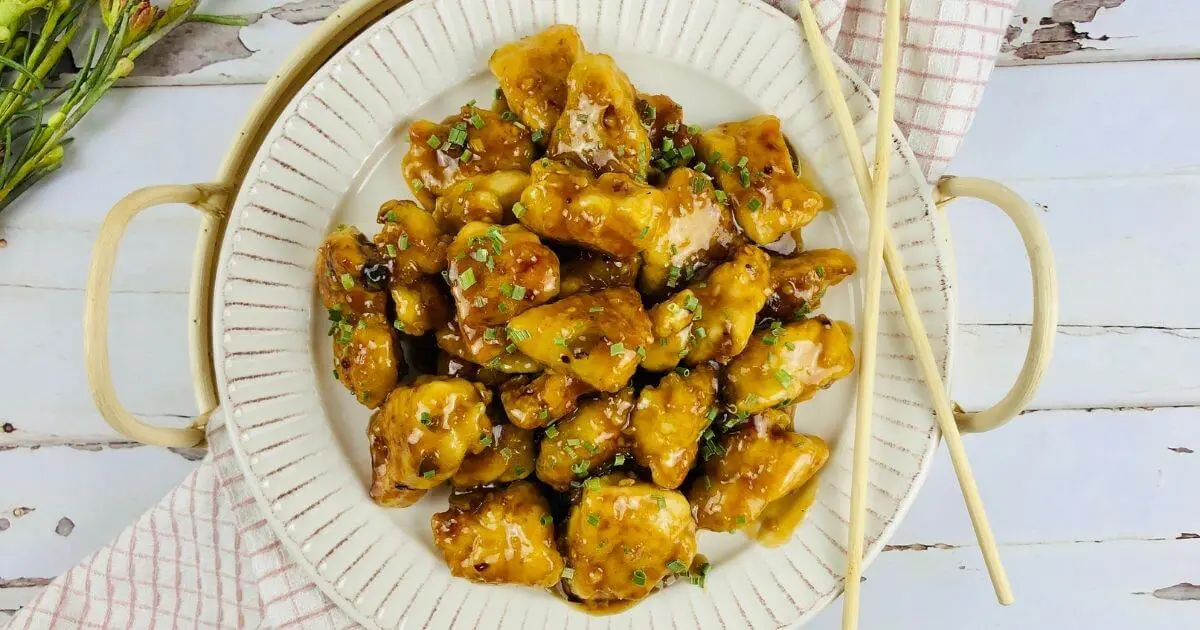 gluten free chinese food on a plate with chopsticks