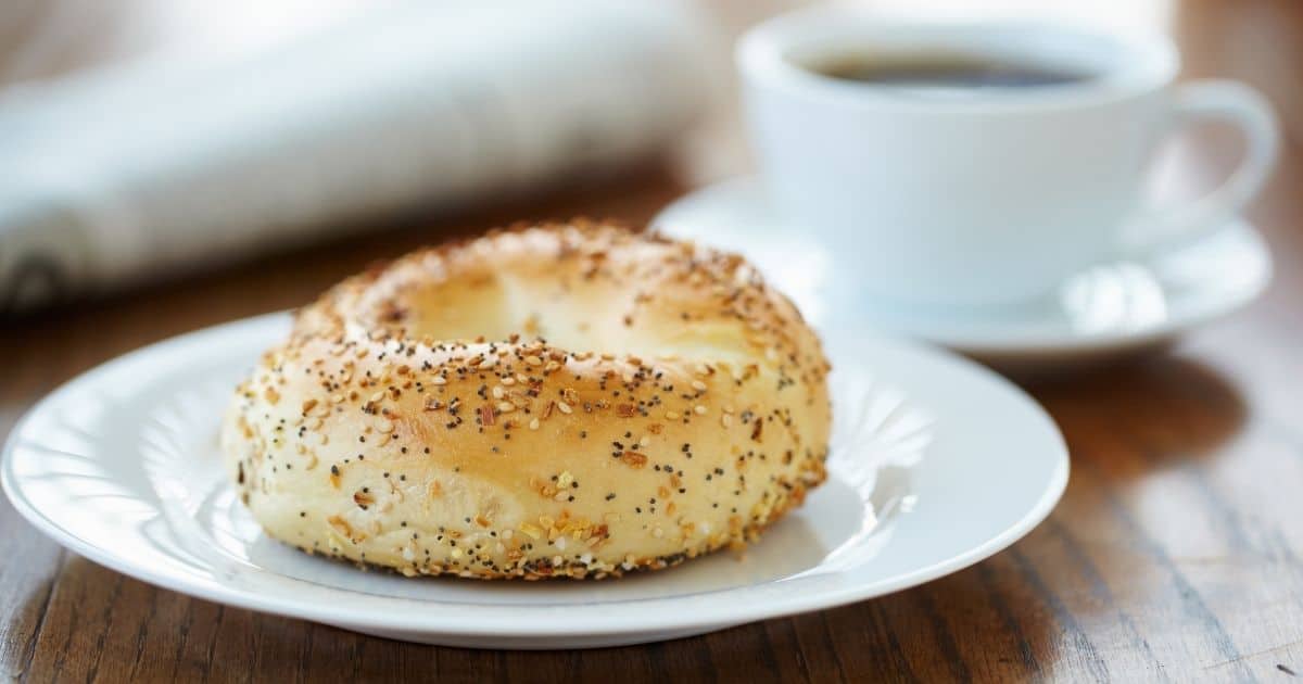 bagel on a plate on a table