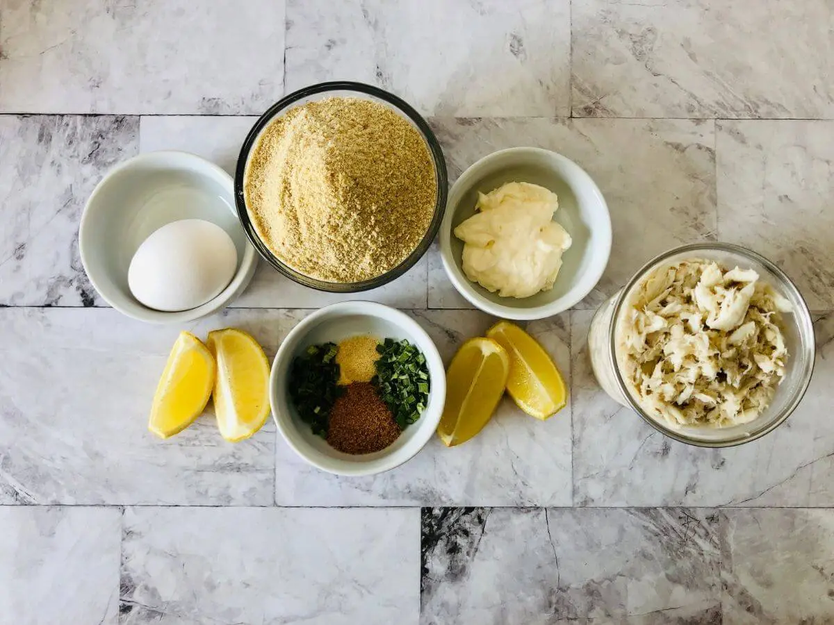 small bowls full of ingredients for making gluten free crab cakes