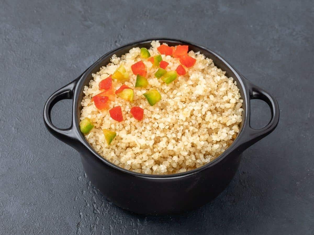 Attieke in a black bowl for the post: Is Couscous Gluten-Free?