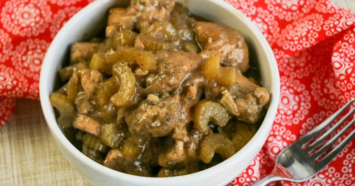 Panda Express Black Pepper Chicken in a white bowl against a red and white background.