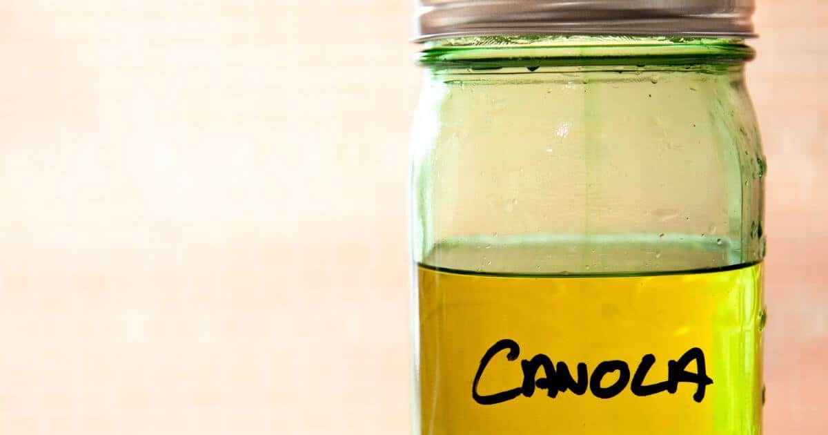 Bottle filled with oil labled "Canola".