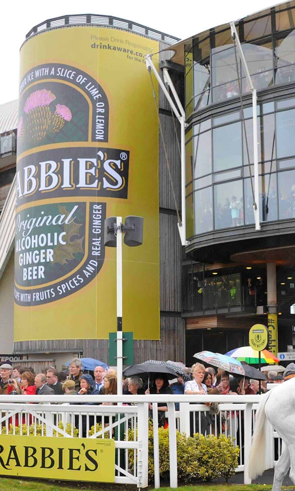 The Crabbies Ginger Beer building with a crowd of people out front.