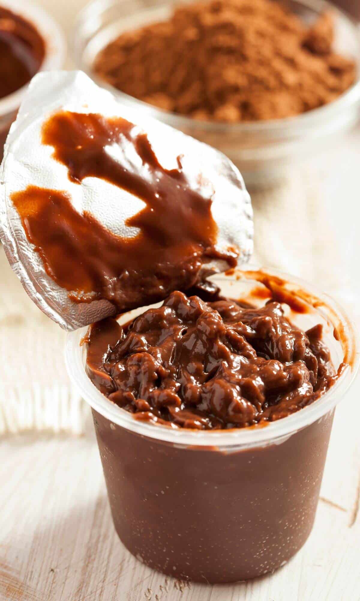 An open container of chocolate Hunt's Snack Pack pudding.