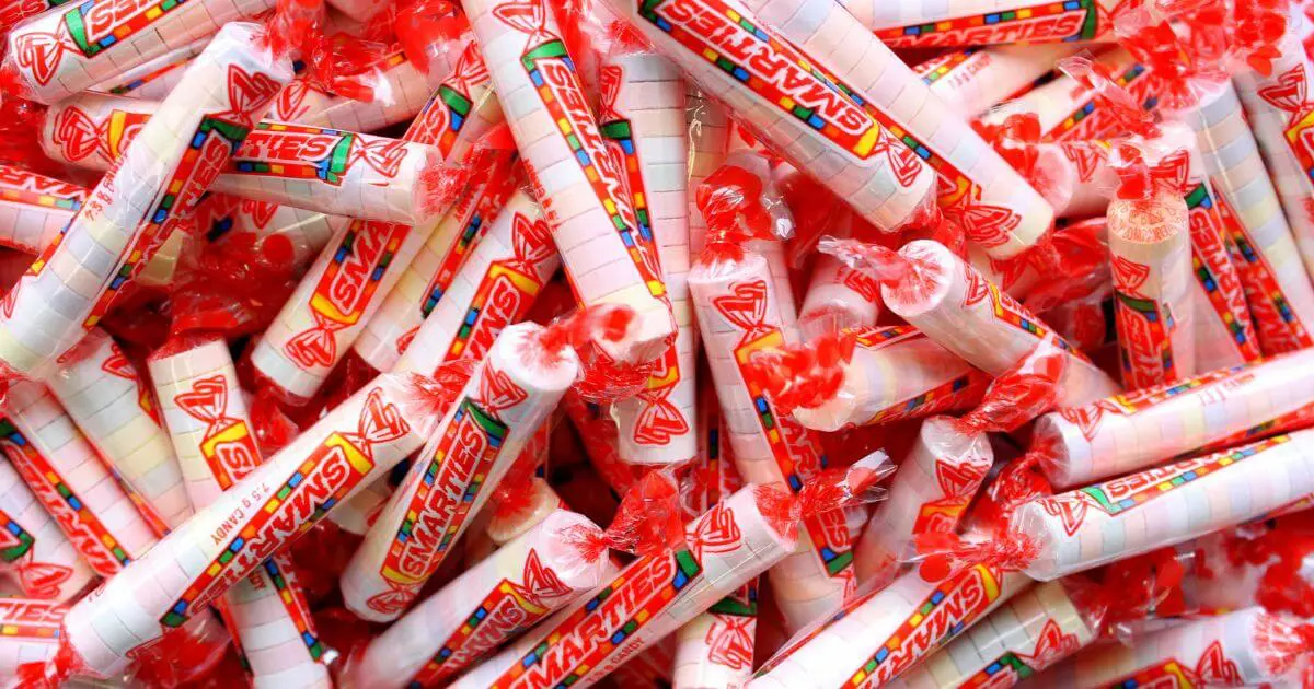 Many rolls of Smarties candies.
