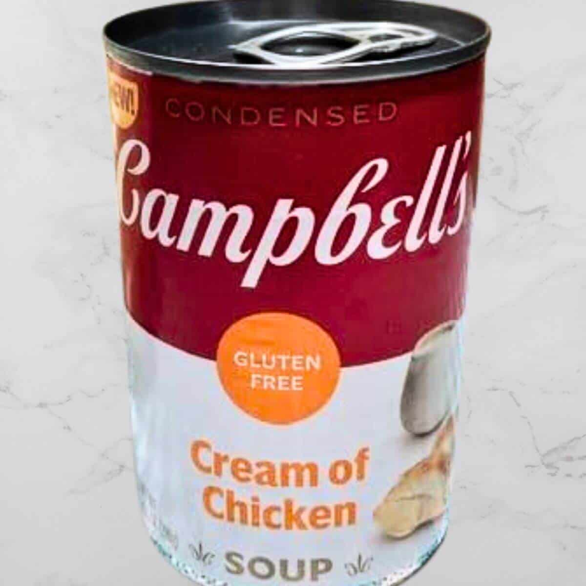A can of Campbel's gluten free cream of chicken soup.