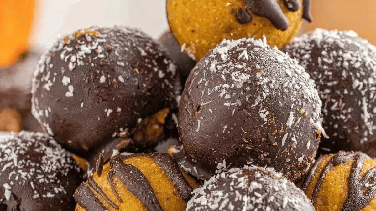 A pile of dark chocolate truffles.