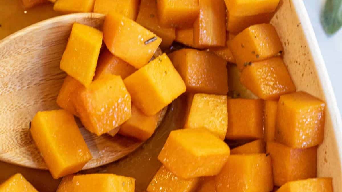 A casserole of maple roasted butternut squash cubes.