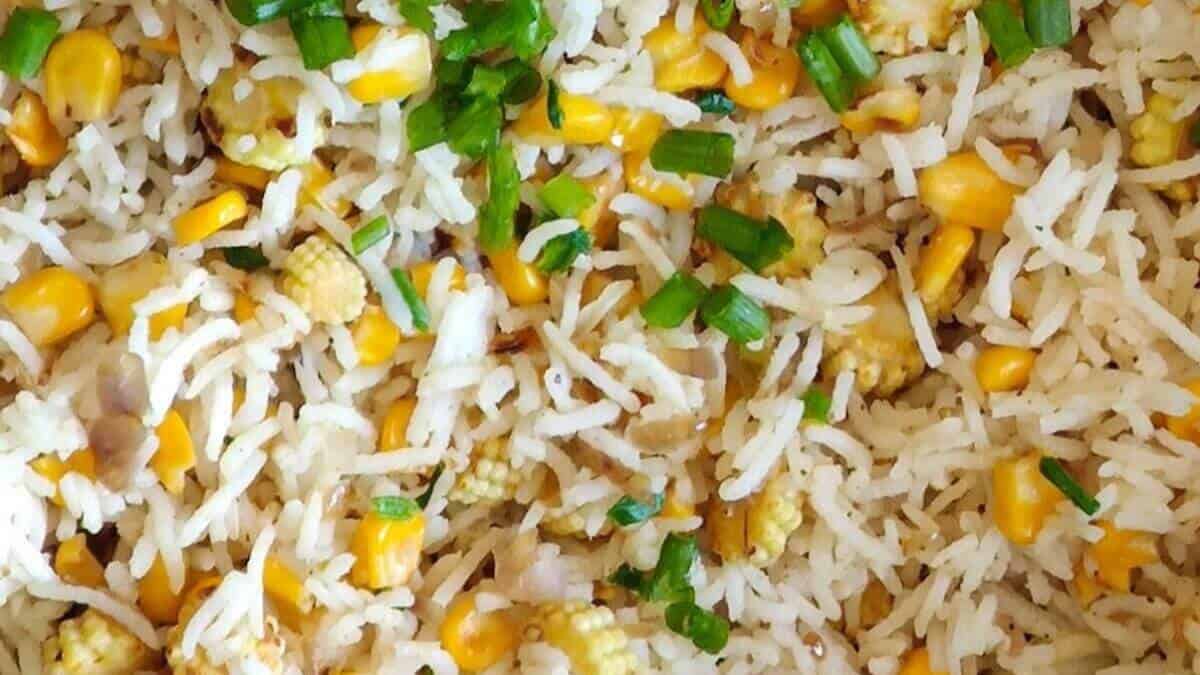 A close up view of corn fried rice.