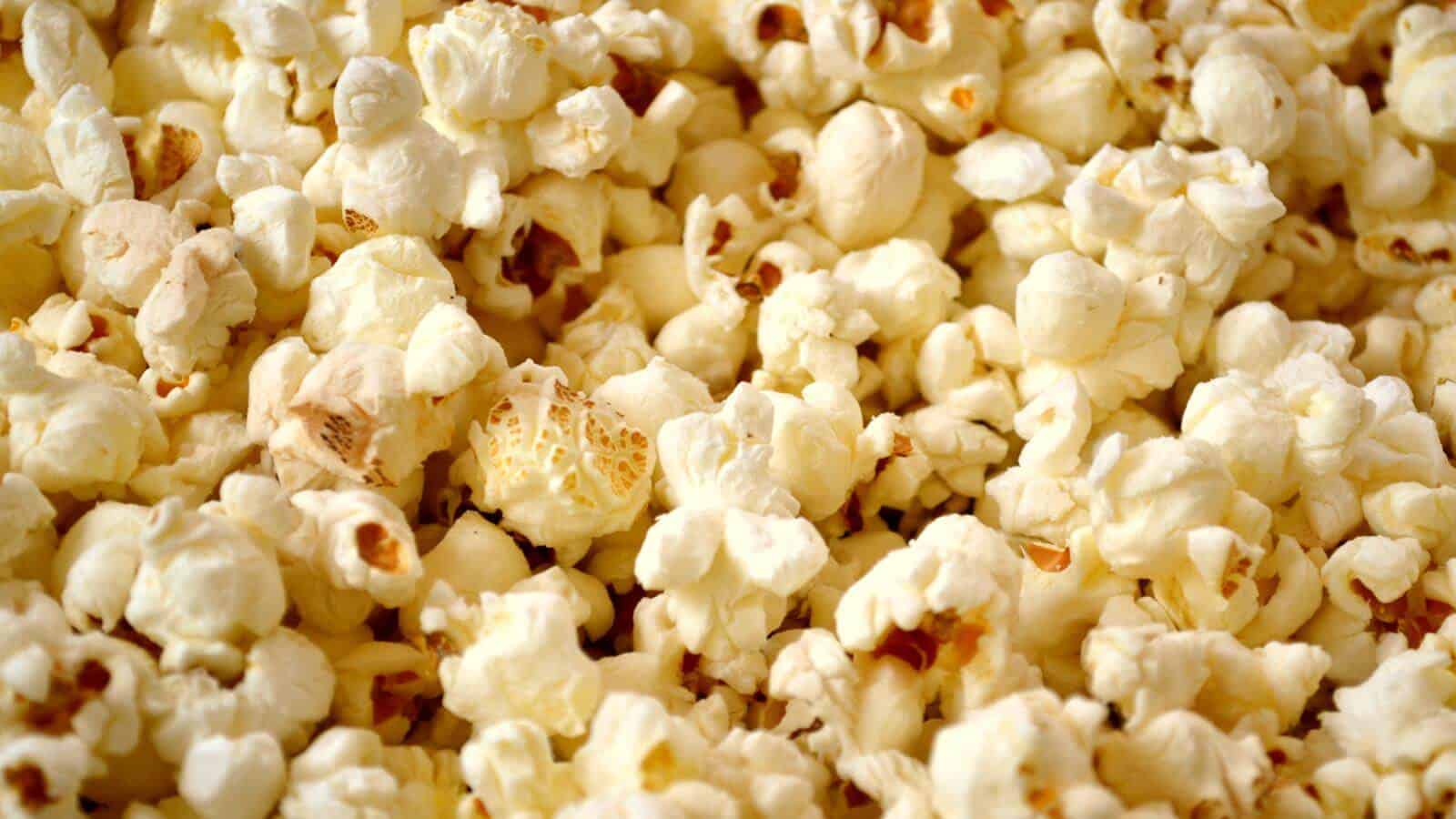 A close up view of popped popcorn.