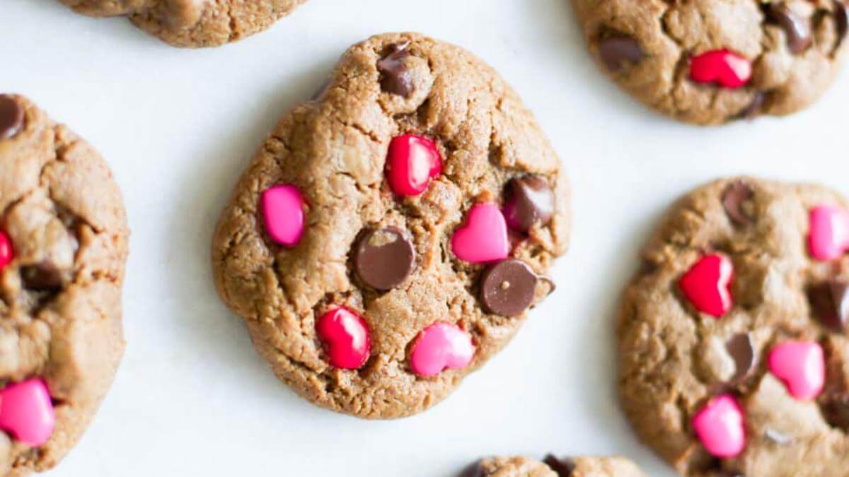 Cookies with chocolate chips and heart shaped sprinkles.