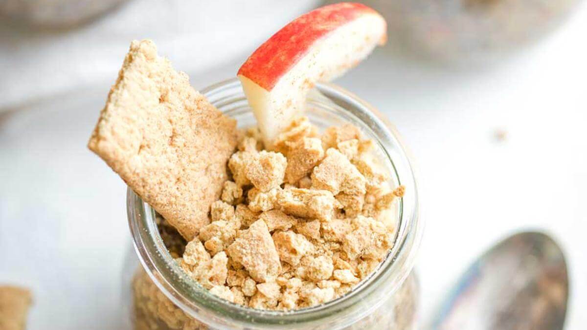 Apple pie chia seed pudding in a glass jar.
