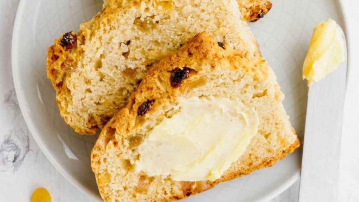 Sliced soda bread with butter.