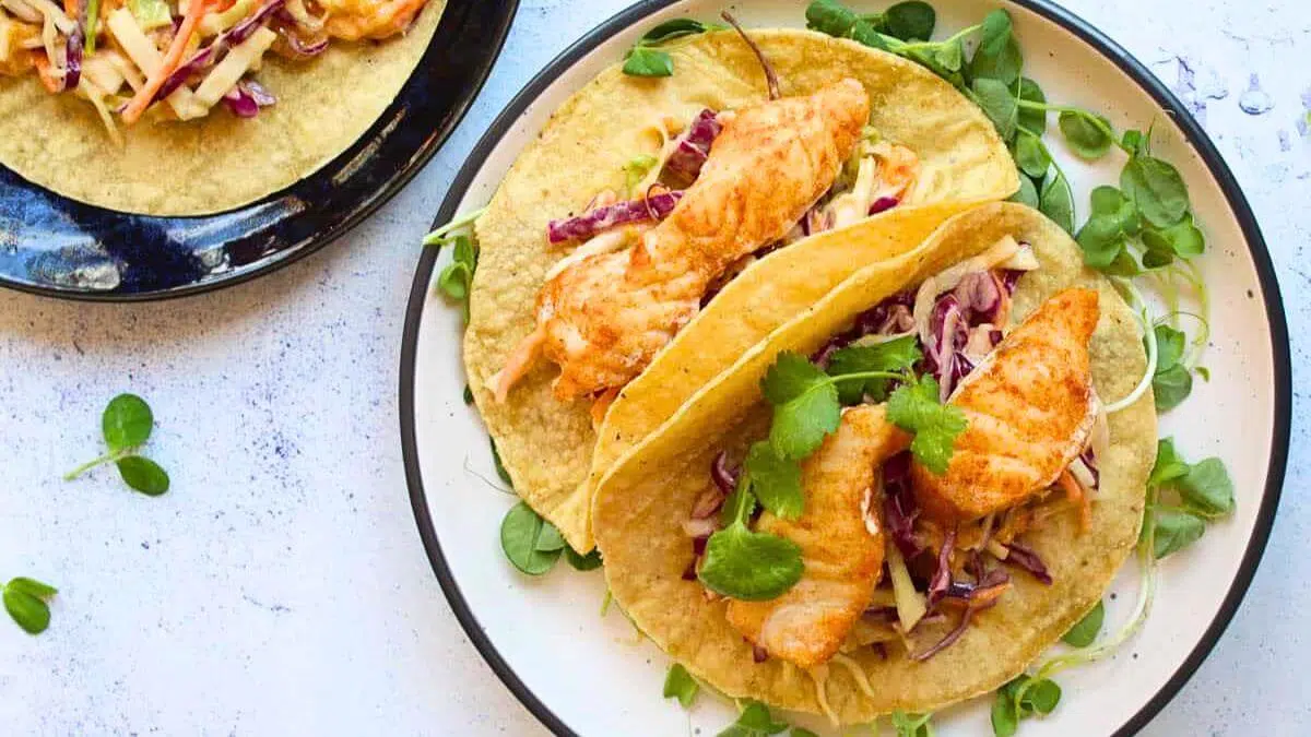 Fish tacos on a plate.