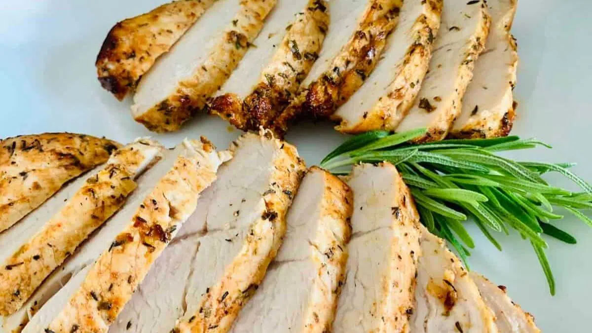 Sliced turkey tenderloin on a plate.