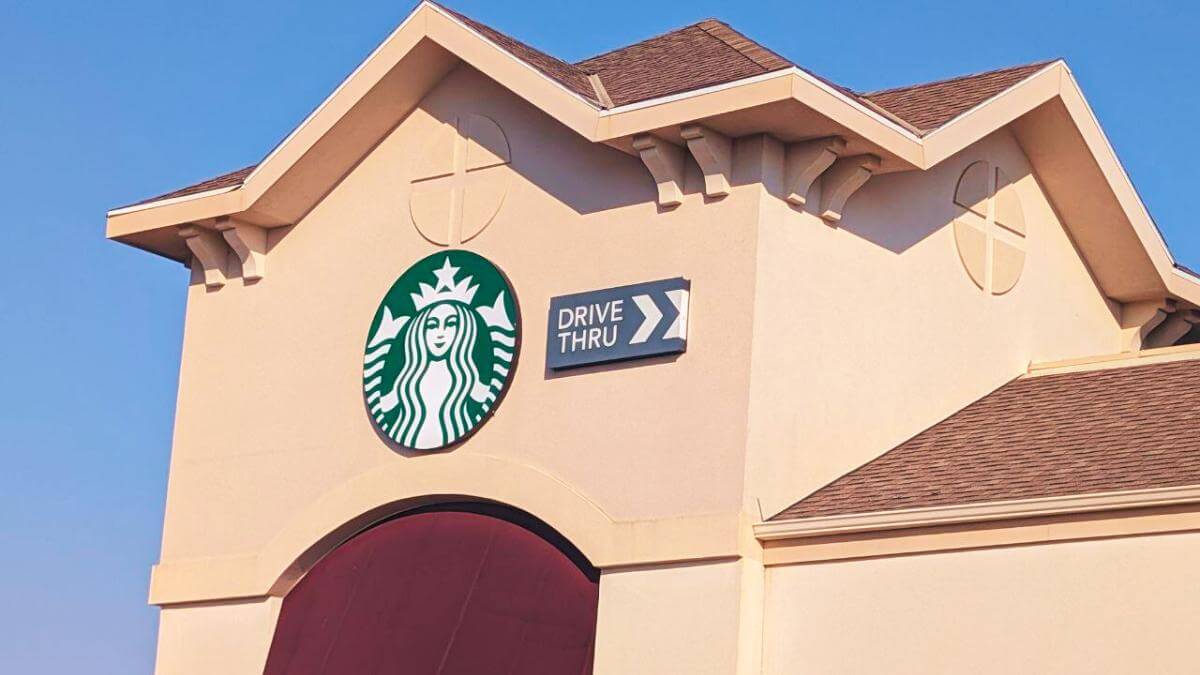 The front of a Starbucks restaurant.