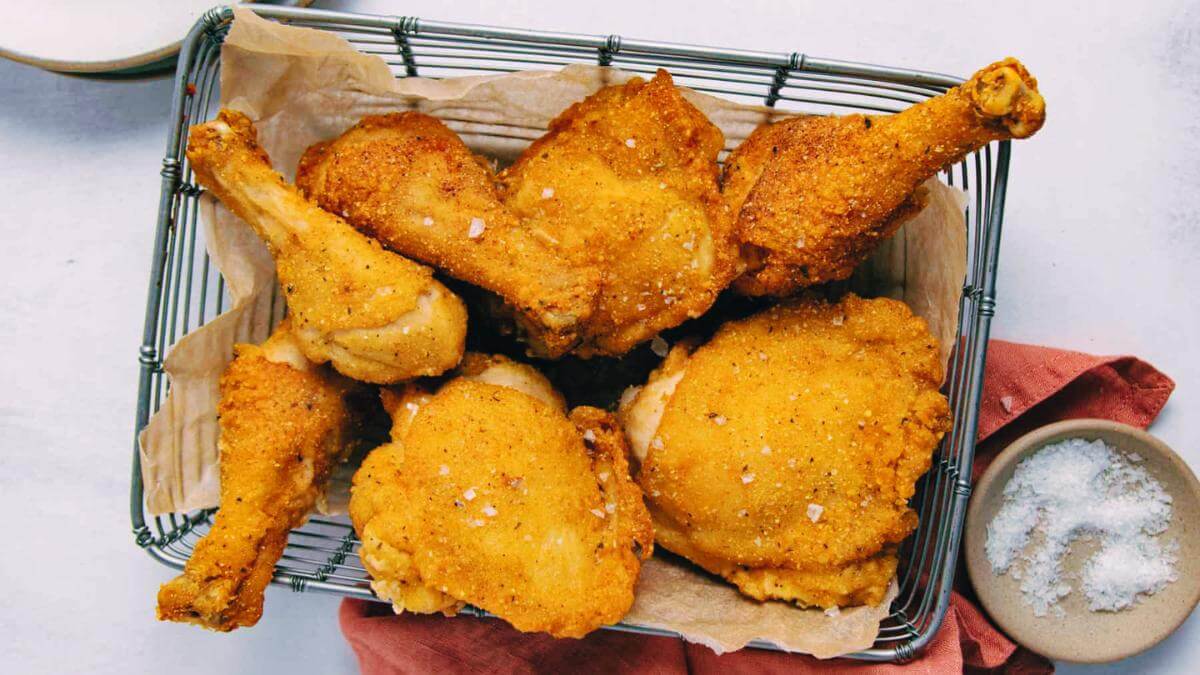 A basket of gluten free fried chicken.
