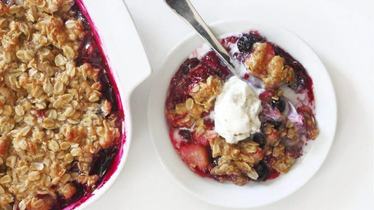 A bowl of blueberry rhubarb crisp.
