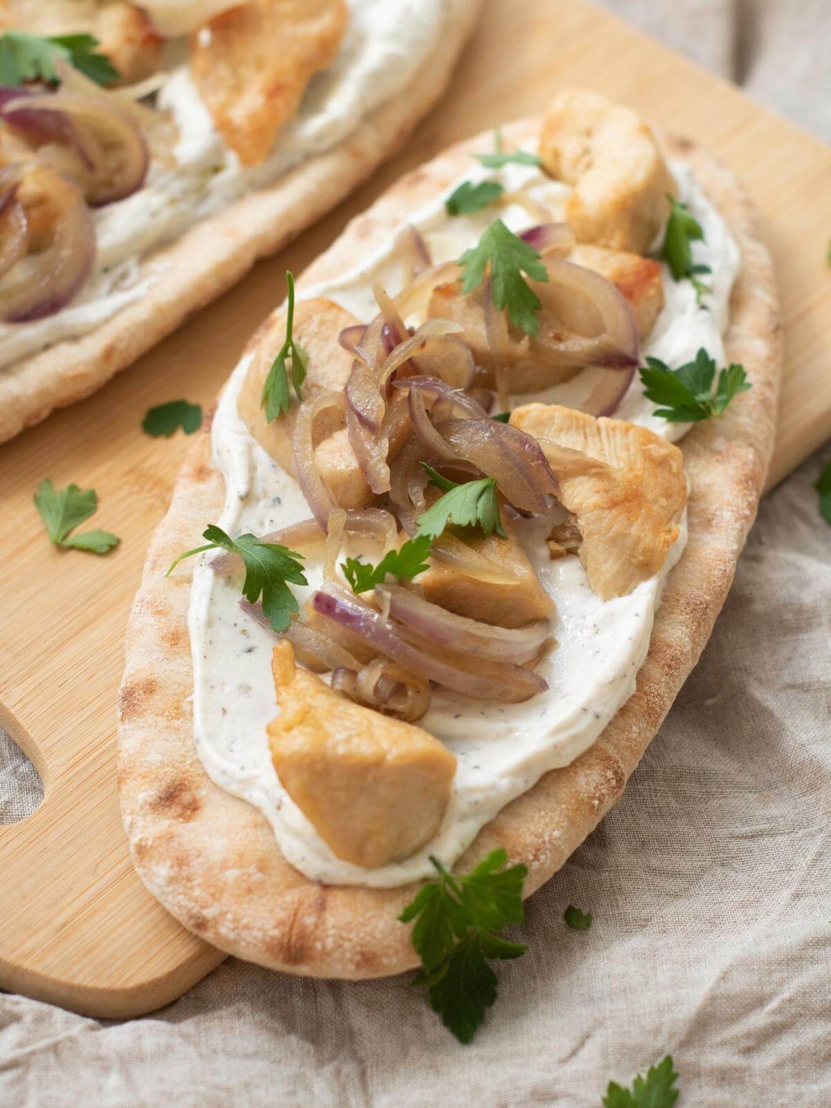 Loaded Greek chicken pitas.