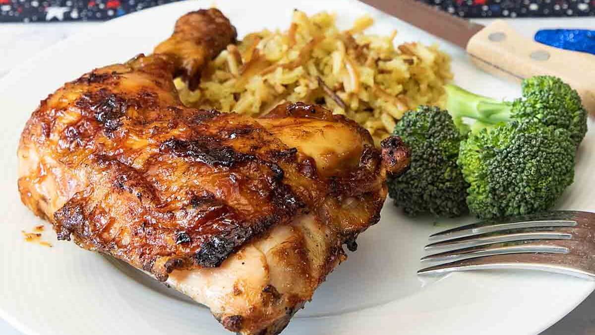 Grilled bbq chicken on a plate.