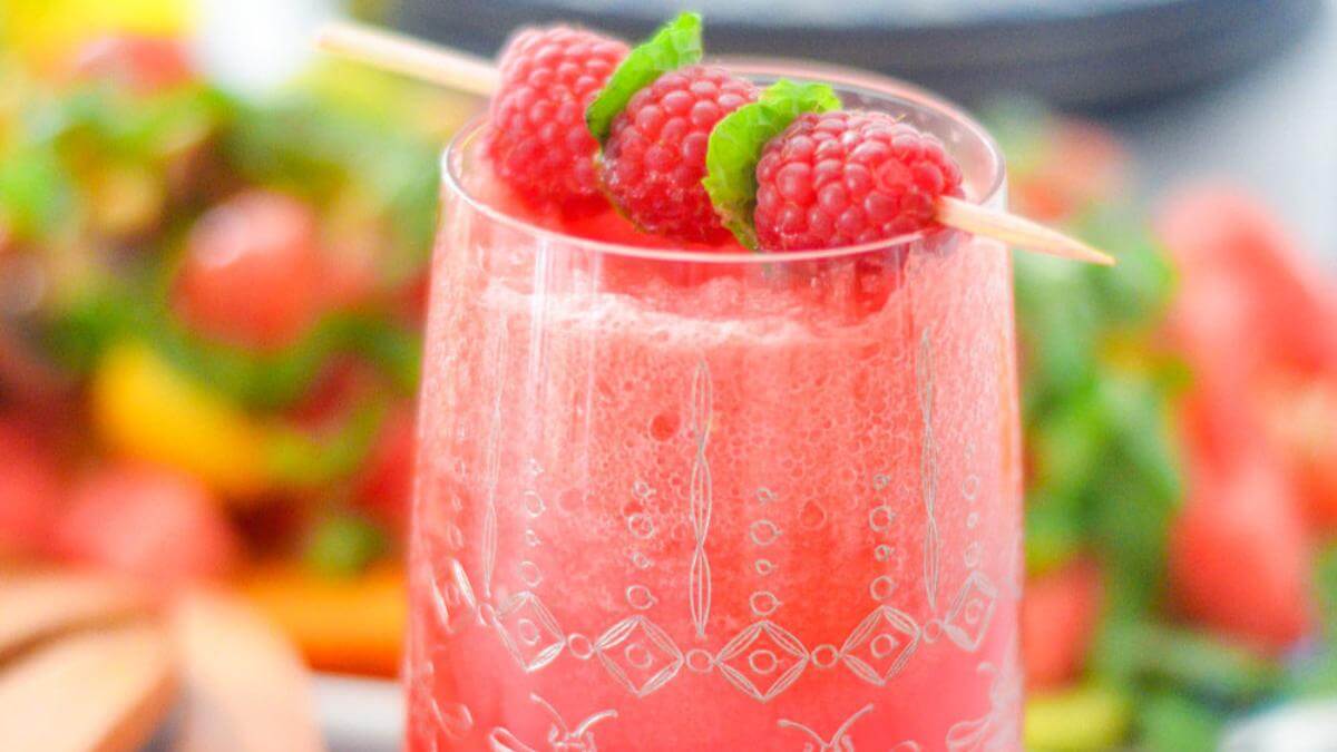 A watermelon raspberry mocktail drink.