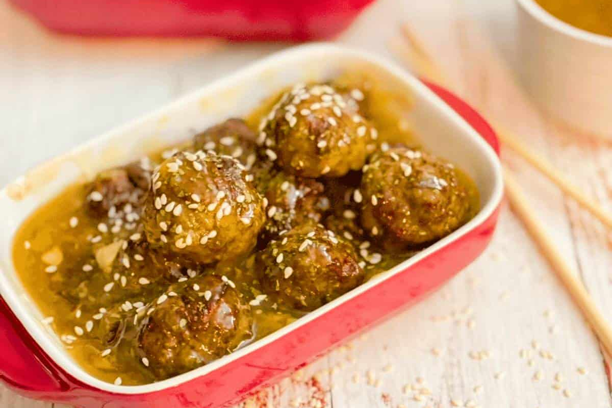 Meatballs in a red dish.