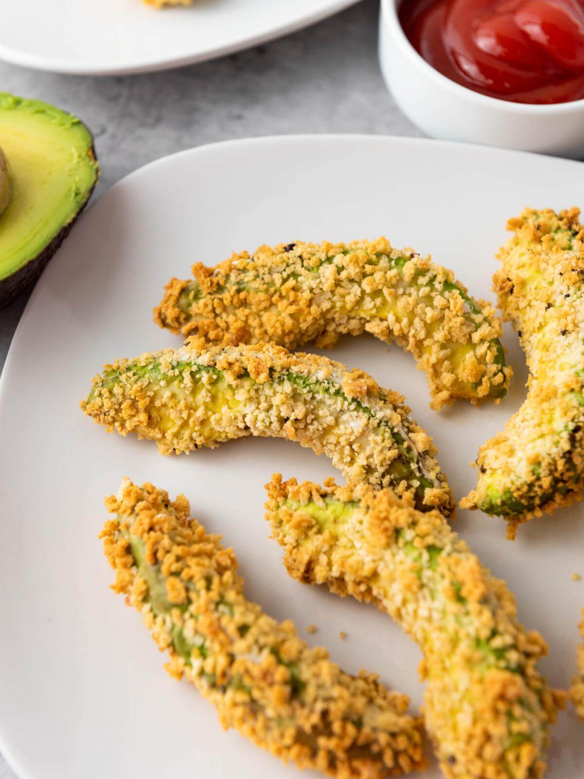 Avocado fries on a plate.