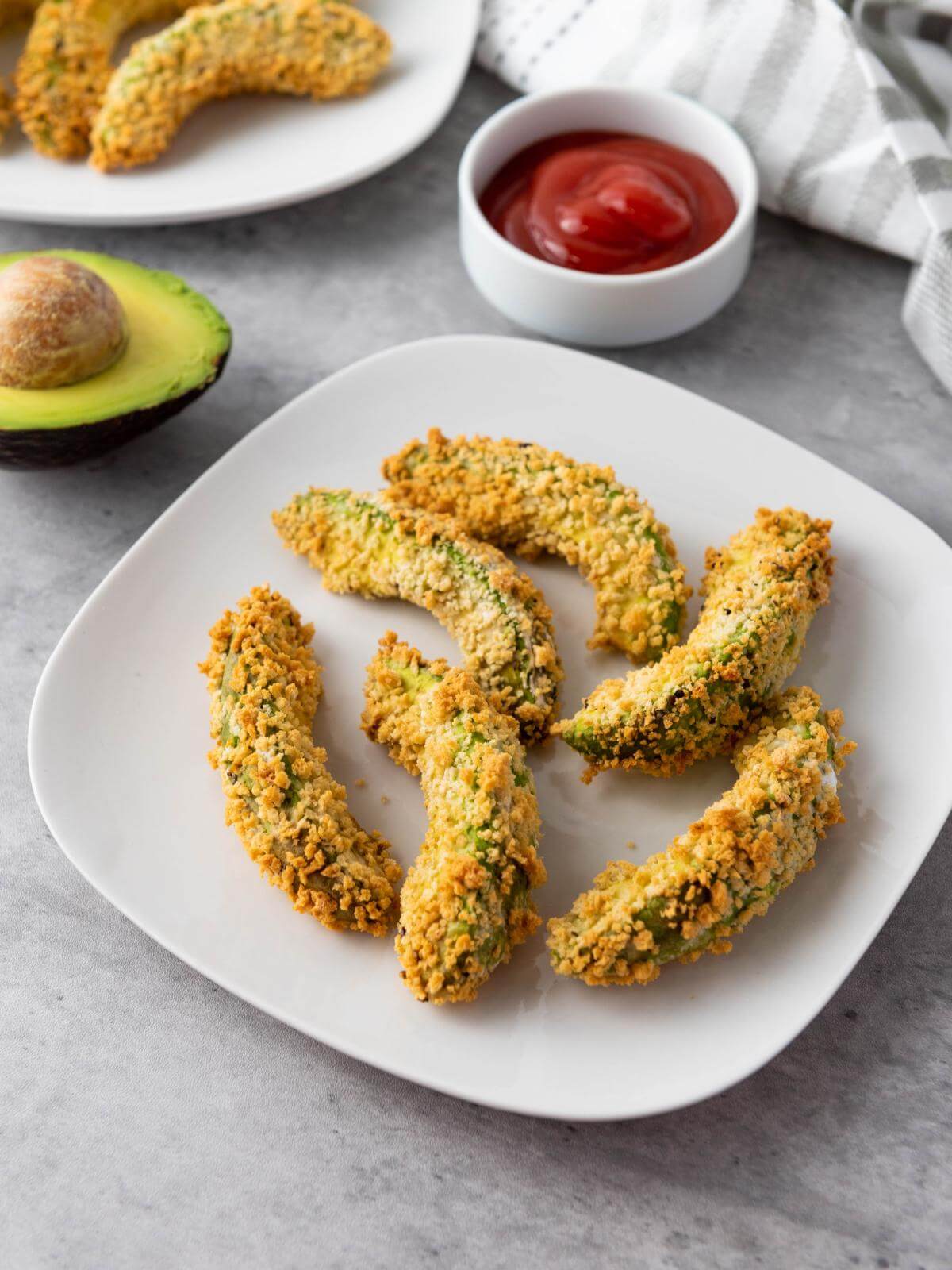 Avocado fries on a plate.