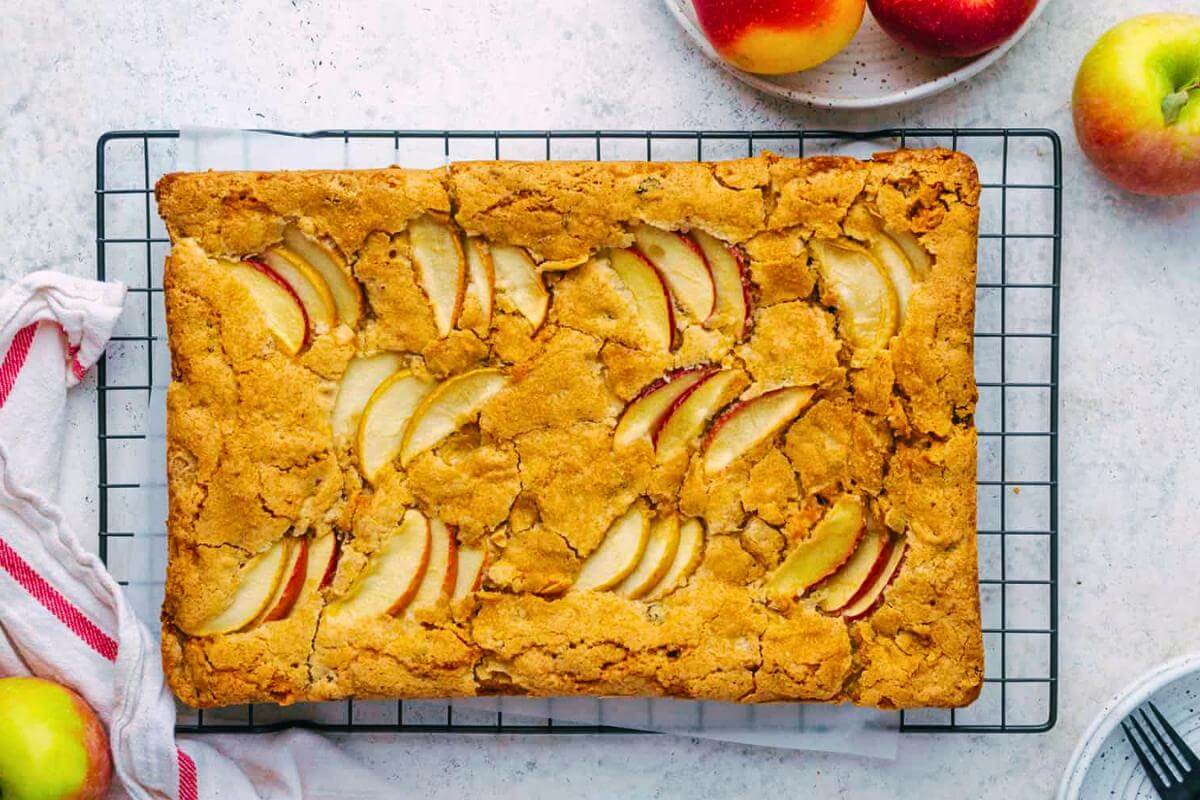 Gluten free apple cake on a rack.