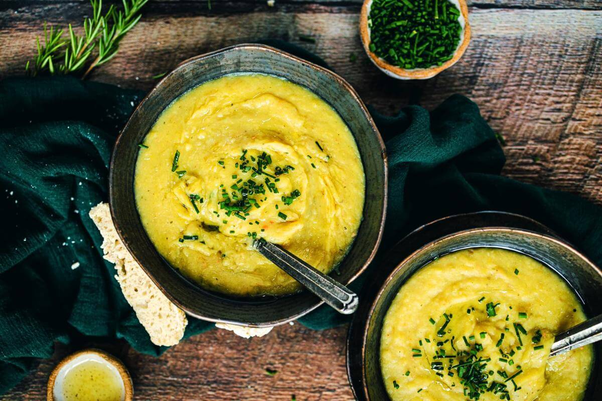 Potato leek soup in bowls.