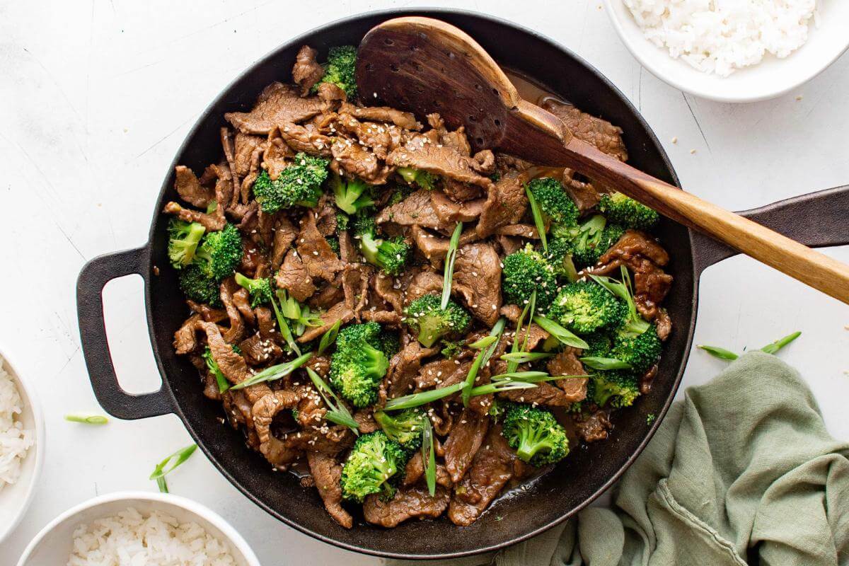 Beef. and broccoli in a skillet.