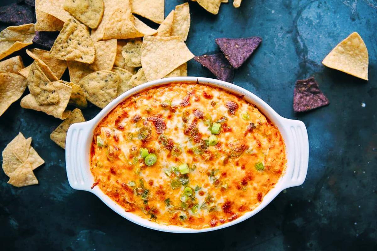 Buffalo chicken dip in a dish.