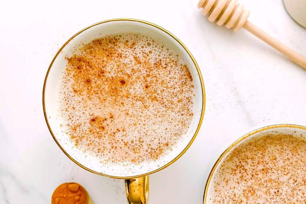 A mug full of cinnamon milk.