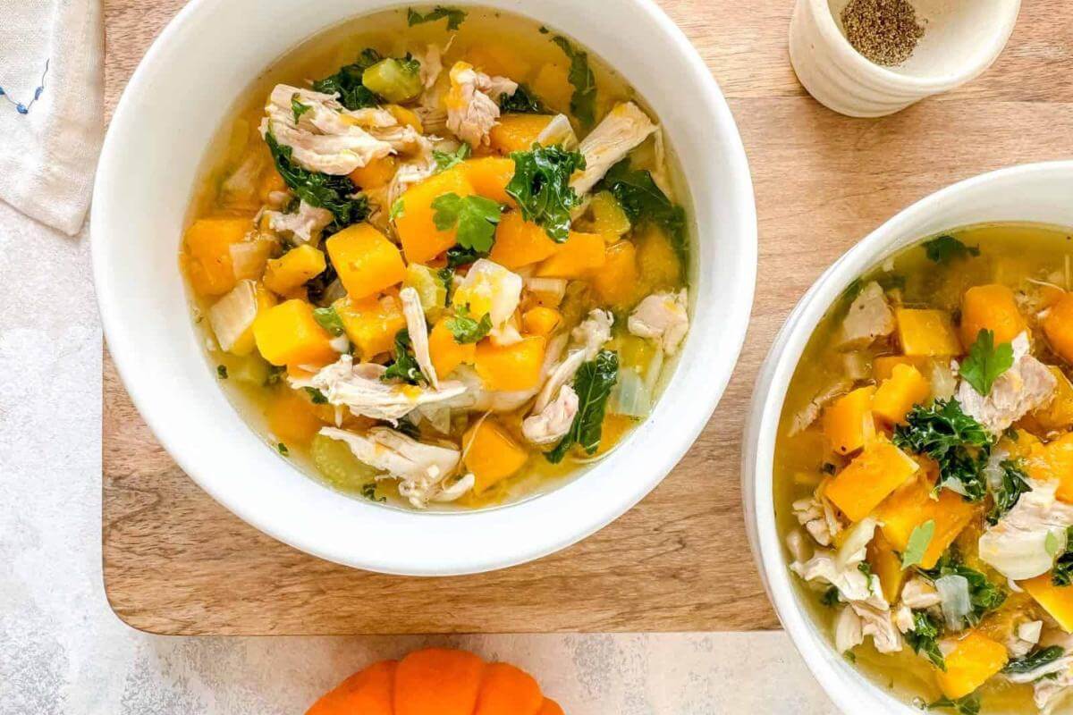 Bowls of chicken and butternut squash soup.