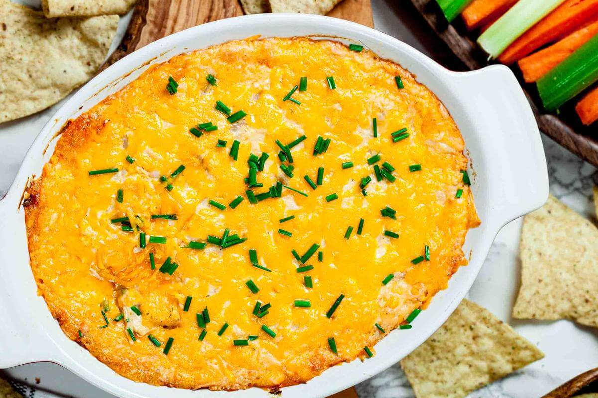 Buffalo chicken dip in a dish.