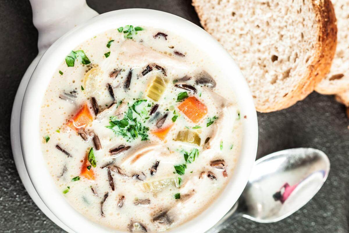 A bowl of chicken and wild rice soup.