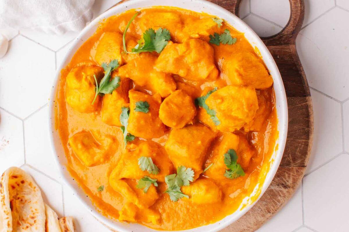 A bowl of coconut curry chicken.