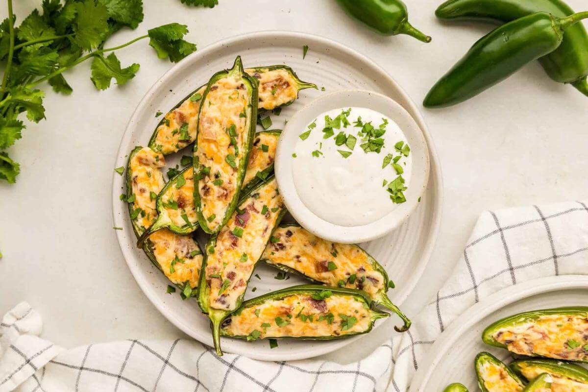 Jalapeno poppers on a plate.