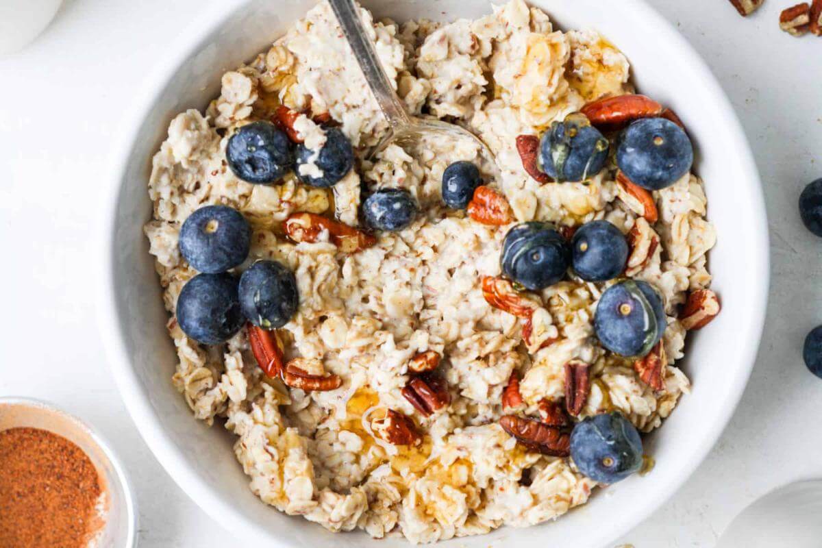 Flax seeed oatmeal with blueberries in a bowl.