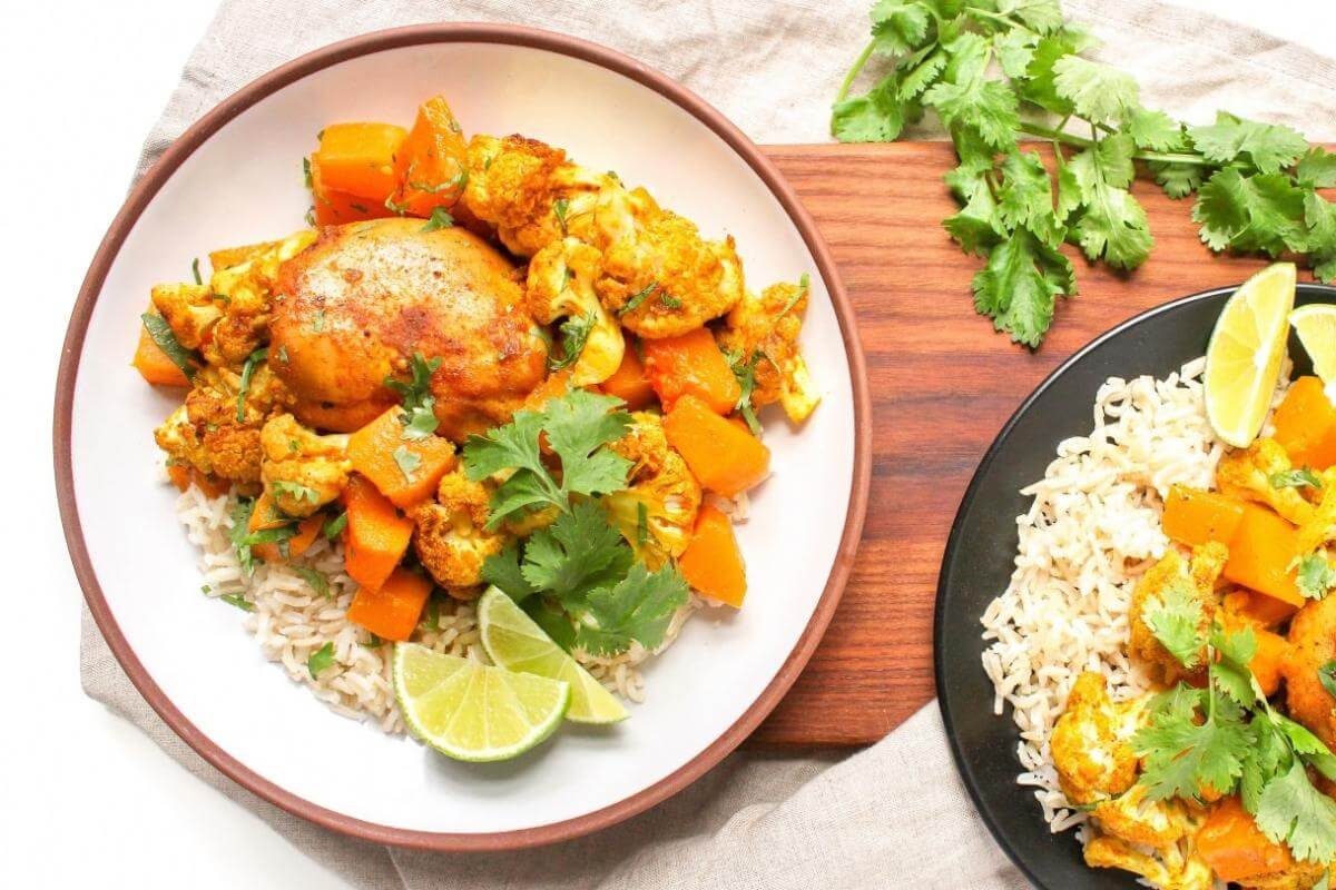 Baked curry chicken on a plate.