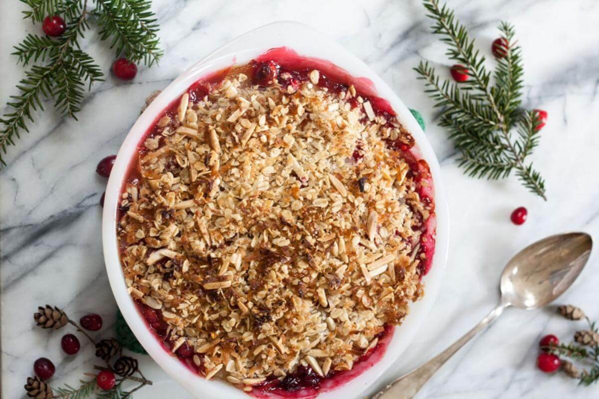 Apple cranberry crisp in a bowl.