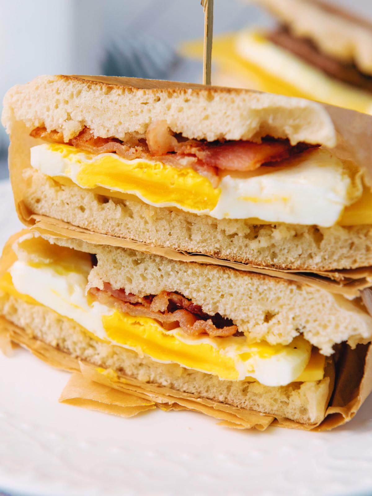 A cut breakfast sandwich.