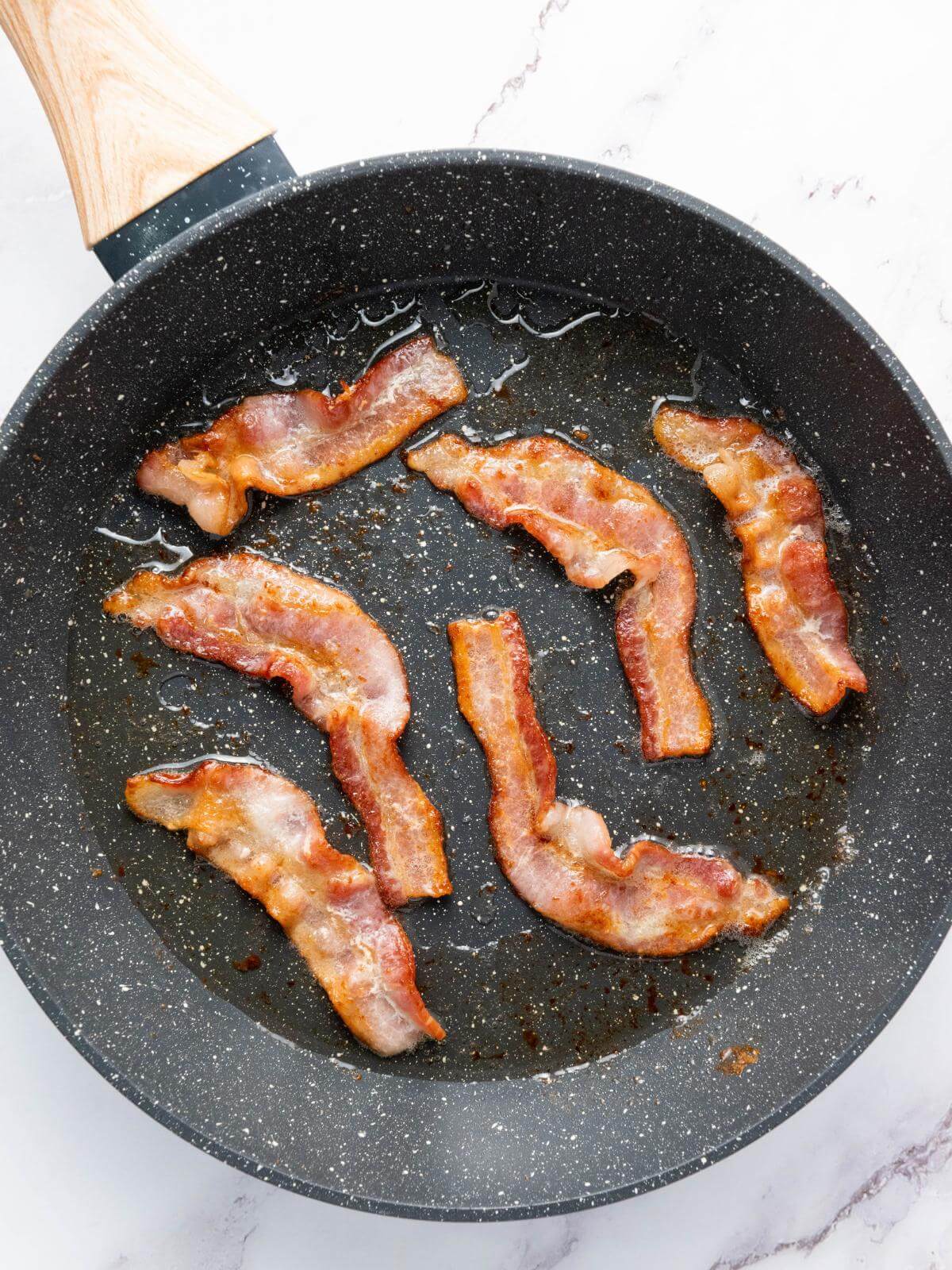 Bacon in a pan.