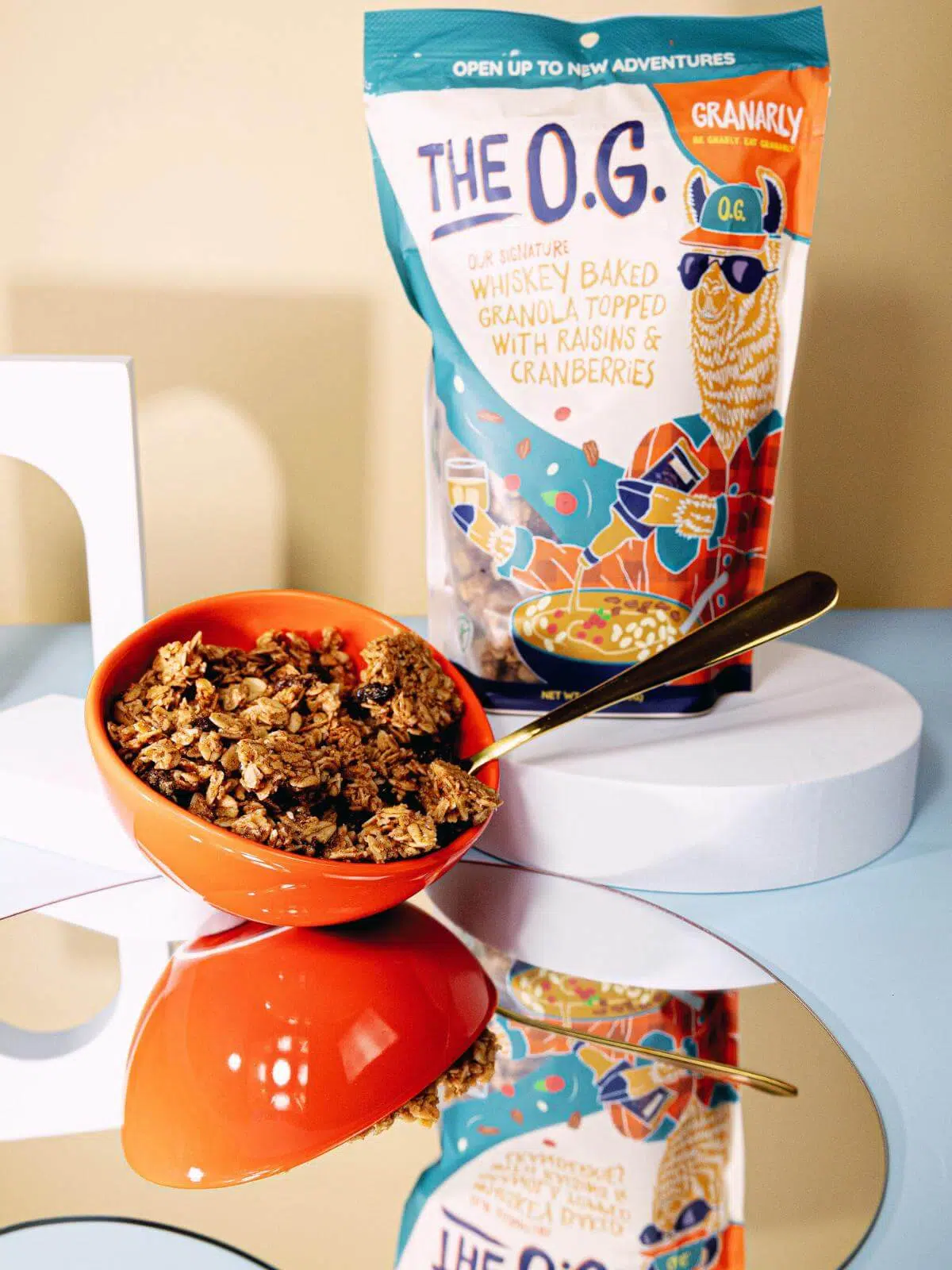 A bowl and a bag of Granarly granola.