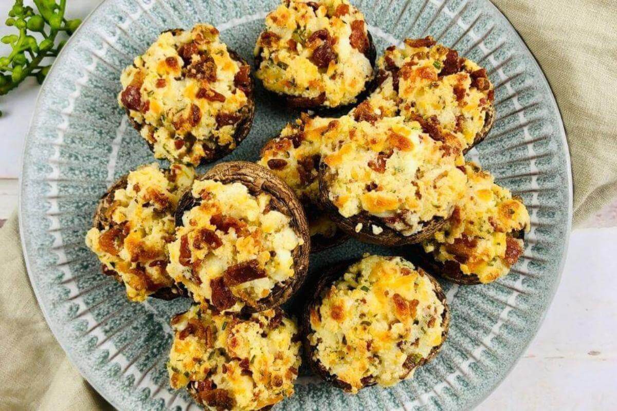 A plate full of gluten free stuffed mushrooms.