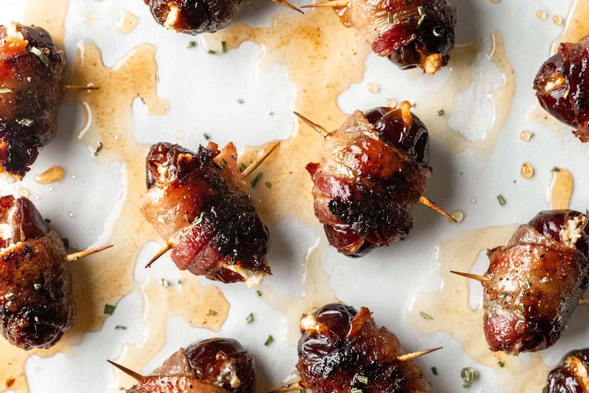 Goat cheese stuffed dates drizzled with honey.