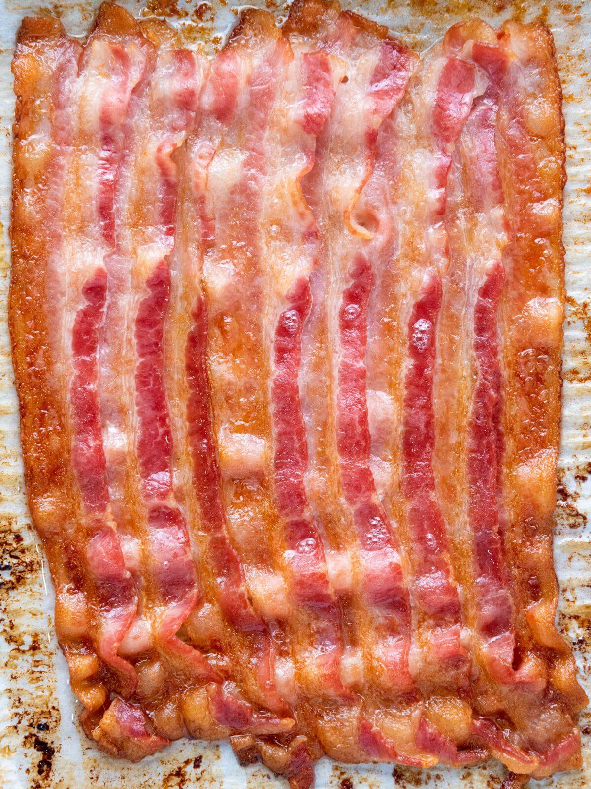 Cooked bacon slices.