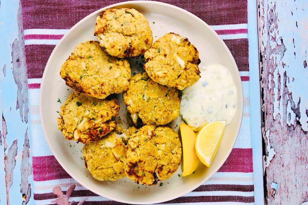 Gluten free crab cakes on a plate.